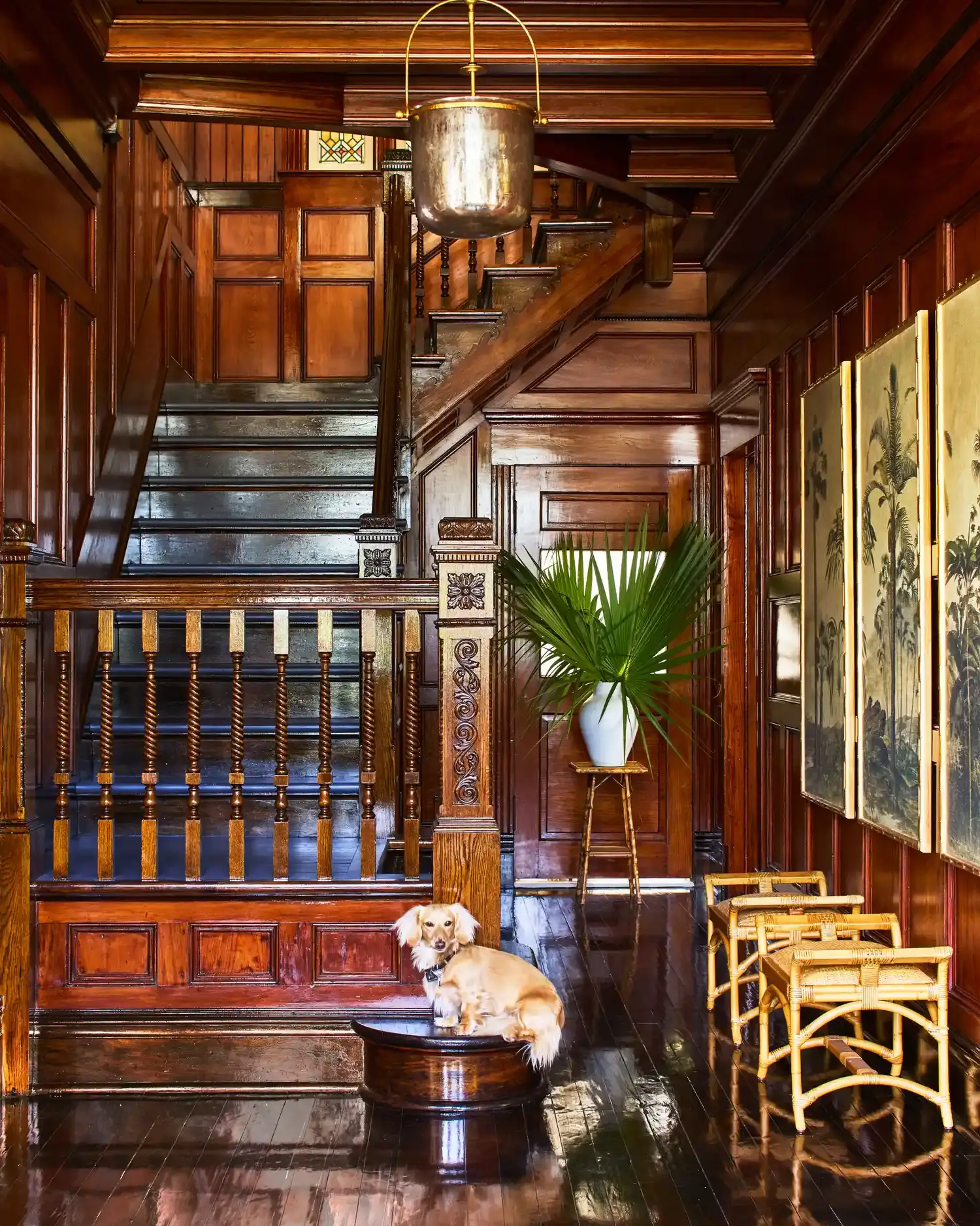 The cypress and heart-pine stair hall of the Barefield House, refinished to a gloss.